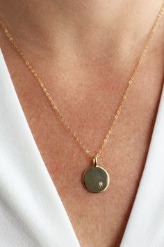 "Moonstone gold coin necklace, moonstone pendant necklace, stacking necklace, minimalist gold necklace, 14K gold filled chain, gift for her NEW BEGINNINGS GROWTH PROSPERITY TRUST TRANSFORMATION Get elegant with this subtle Moonstone Gold Necklace, an everyday essential and made for easy layering. Some suggestions are shown in the photos. Feel the strong connection of Moonstone to the lunar cycle, reminding us that everything is part of a cycle of change. Let it provide you with the source of inn Minimalist Coin Necklace With Round Pendant, Everyday 14k Gold Filled Coin Necklace With Round Pendant, Delicate Everyday Coin Necklace, Minimalist Tarnish-resistant Coin Necklace, Minimalist 14k Gold Filled Round Disc Necklaces, Minimalist 14k Gold Filled Coin Necklace Gift, Minimalist 14k Gold Filled Coin Necklace For Everyday, Everyday Delicate Round Coin Necklace, Minimalist Yellow Gold Coin Necklace