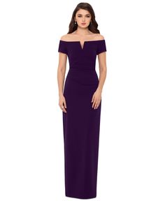 a woman in a long purple dress with one shoulder and an open slit on the side