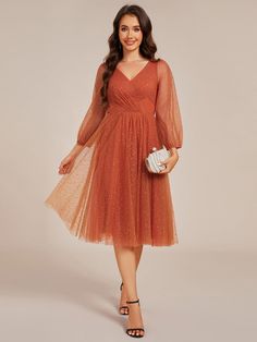 Shine at your next event with this Glittery Long Sleeve V-Neck Midi Wedding Guest Dress. Crafted with shimmering fabric, this dress features a flattering V-neckline and long sleeves for a touch of elegance. Its midi length provides the perfect balance of sophistication and comfort, making it ideal for weddings and formal occasions. The subtle sparkle adds just the right amount of glamour, ensuring you make a memorable entrance. Fit: Please refer to size chart. Length: Midi length. Sleeve Style: Wedding Guest Dress Sleeves, Midi Wedding Guest Dress, Dress Sleeves, Burnt Orange Dress, Prom Dresses Sleeveless, Guest Dress, Tulle Wedding, Wedding Guest Dresses, Long Sleeve Midi