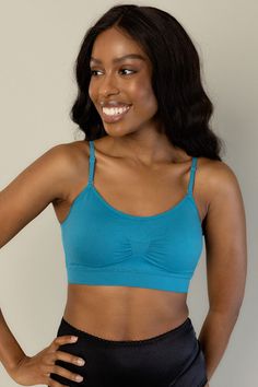 Our seamless bra is made from high-quality, breathable materials that contour to your body for a perfect fit. This will make you fall in love with wearing bras again! Scoop Neck Bra With Built-in Support, Scoop Neck Seamless Bra, Seamless Fitted Sports Bra With Scoop Neck, Fitted Seamless Sports Bra With Scoop Neck, Medium Support Seamless Yoga Bra, Seamless Sports Bra For Relaxation, Compressive Solid Sports Bra With Seamless Design, Seamless Shaping No-show Nursing Bra, Scoop Neck Seamless Yoga Bra