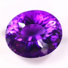 an amethyst purple diamond on a white background