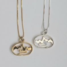 "Sterling Silver or Gold Mountain Pendants, include your choice of sturdy solid Sterling Silver or Gold-filled Box chain - either 16\" or 18\".   We were inspired by the Grand Teton Mountains and Snake River when we originally designed this pendant. It resembles other ranges from Colorado to Alaska. This necklace is reversible, giving a little bit different perspective of the mountain when turned around. We cast this Charm from pure sterling silver and the gold is plated with a heavy layer of 14 Mountains With River, Gold Mountain, Mountain Necklace, Mountain River, Necklace Sterling Silver, Box Chain, Jump Rings, The Mountain, The Gold