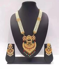 Create A Buzz Around Your Corner By Wearing This Necklace Set, You Will Always Be The Center Of Attraction Of Any Gathering By Wearing This Jewelry. The Kundan Stones elevate this piece to a collector item in every jewelry collection. Team it with a kurta or a sari and you are sure to stand out and receive many compliments. The Perfect Gift : Ideal for the Woman who loves products that are Handmade In India and artisanal. All occasion jewelry for through out the year from Valentines Day ,a Special Birthday or an Anniversary gift for your special one. CARE INSTRUCTIONS  Keep it away from perfumes, sprays & Water. It Is Advisable To Store Jewelry In A Zip Lock Pouch (Air Tight Pouch), Keep Away From Water Perfume And Other Chemicals And Clean It With Dry And Soft Cloth White Jewelry For Navratri Ceremonial, White Ceremonial Jewelry For Navratri, Traditional White Jewelry For Navratri, Traditional Multicolor Jewelry For Traditional Ceremonies, Traditional Multicolor Jewelry For Ceremonies, Traditional Jewelry With Stone Work For Festivals, Traditional Festive Jewelry With Latkans, White Kundan Jewelry For Traditional Ceremonies, Traditional Necklaces With Latkans For Diwali