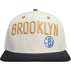 Make your Brooklyn Nets fandom easy to notice by wearing this Album Cover hat from Pro Standard. It features an authentic Brooklyn Nets logo in raised embroidery on the front, back and sides to ensure your spirit is showcased loud and proud. The snapback design lets you quickly adjust the fit for customized comfort. Imported Flat bill Officially licensed Structured fit Contrasting color undervisor Six panels with eyelets High Crown Material: 70% Acrylic/30% Wool - Body; 100% Leather - Button Wip Embroidered Logo Snapback Trucker Hat For Fans, Adjustable Six-panel Snapback Hat For Fans, Adjustable Six-panel Snapback Hat For Fan Gear, Collegiate Six-panel Snapback Hat With Embroidered Logo, Snapback Hats With Embroidered Logo For Fan Gear, Logo Six-panel Hat For Streetwear, Urban Snapback Hat With Embroidered Logo, Collegiate Six-panel Snapback Hat For Streetwear, Urban Snapback Hat With Embroidered Logo And Curved Brim