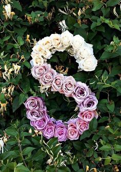 the letter g is made out of flowers