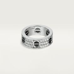 Cartier - Love ring, diamond-paved, ceramic - Ring White gold/Ceramic/Diamond - Love ring, 18K white gold, black ceramic, set with 66 brilliant-cut diamonds totaling 0.74 carats. Width: 6.5mm. Cartier Earrings, Cartier Love Ring, Hip Hop Rings, Gold Ceramic, Ring White Gold, Ceramic Rings, Ceramic Set, Cartier Love, Unisex Ring