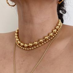 Introducing our exquisite 18K Gold Plated Stainless Steel Ball Chain Statement Necklace, a true embodiment of elegance. Crafted with precision, this necklace features a 5mm ball chain that is not only visually stunning but also resistant to tarnishing, ensuring its everlasting beauty. For reference, our model showcases the plain ball chain style at a length of 18 inches parting it with 17.5" 10mm ball chain. for the large ball chain please follow the link below https://www.etsy.com/listing/14934 Ball Necklace Gold, Elegant Gold Plated Necklaces With Ball Chain, Gold Ball Chain Jewelry For Party, Formal Yellow Gold Ball Chain Jewelry, Elegant Ball Chain Jewelry For Formal Occasions, Elegant Formal Jewelry With Ball Chain, Ball Chain Choker Jewelry Gift, Ball Chain Choker As A Gift, Ball Chain Choker Jewelry As Gift