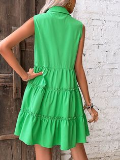 Features: Make a statement on vacation or day-to-day with the Madison Summer Casual Loose Sleeveless Ruffle Beach Dress. Crafted with a lightweight fabric, this dress will keep you feeling cool while looking fashionable. Its elegant design features a ruffle hem and green button detailing. Stay comfortable and stylish all summer long. Sleeveless Ruffled Sundress For Summer Outings, Green Tiered Sundress For Summer, Spring Sleeveless Mini Dress For The Beach, Tiered Mini Dress For Summer Vacation, Green Tiered Sundress For Vacation, Summer Sleeveless Dress With Ruffles For Beach Season, Tiered Sleeveless Dress For Summer Spring, Casual Green Sleeveless Dress For Day Out, Tiered Sleeveless Summer Dress For Spring