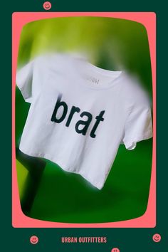 Bumpin' that in this Charli XCX Brat graphic baby tee. Designed in a slim & cropped fit so when you’re looking in the mirror you like what you see. Only at Urban Outfitters. Features Charli XCX Brat graphic baby tee Fitted graphic tee Soft and stretchy knit Crew neckline with short sleeves Brat graphic across the chest Slim fit Cropped length Easy pull-over style UO exclusive Content + Care 100% Cotton Machine wash Imported Size + Fit Model in Green is 5'9" and wearing size Small Measurements taken from size Small Chest: 32" Length: 16.5" | Charli XCX UO Exclusive Brat Graphic Baby Tee in White, Women's at Urban Outfitters Cropped Cotton T-shirt With Text Print, Fitted Cropped T-shirt With Letter Print, White Logo Print Cropped T-shirt, Trendy Cropped T-shirt With Logo Print, Fitted Cropped T-shirt For Streetwear, Trendy Urban Outfitters Relaxed Fit T-shirt, Urban Outfitters Cotton Tops With Text Print, Sporty Cropped Top With Logo Print, Basic Stretch Cropped T-shirt For Streetwear