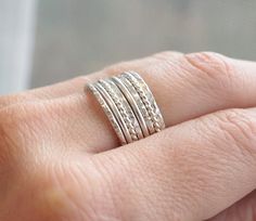 Beautiful mix of .925 sterling silver stacking rings. Slim stackable rings. Set of 8. Also available in 14k yellow and rose gold filled. 2 smooth bands, 2 hammered bands, 2 twist bands, and 2 faceted bands If you don't see your size please feel free to message me. All orders ship in a gift box. If you are ordering multiple items and want them boxed separately, please let me know in the notes at checkout. I ship via USPS. Please review the estimated delivery date and processing times. Processing Adjustable Stacked Sterling Silver Jewelry, Everyday Silver Stacked Rings, Everyday Stacked Silver Rings, Silver Stackable Rings In Fine Jewelry, Stacked Sterling Silver Jewelry For Anniversary, Sterling Silver Stacked Jewelry For Anniversary, Sterling Silver Stacked Promise Rings, Everyday Stackable Sterling Silver Rings, Anniversary Sterling Silver Stacked Jewelry