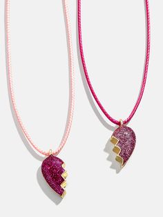 Show some love to your little one and their bestie with the Kids' Heart BFF Necklace Set. Each of these two necklaces feature a glittery split heart that when combined, fit perfectly together. So cute and perfectly pink, your mini me and their bestie won't ever want to take it off. Please note: intended for children 3+. Pink Heart-shaped Jewelry For Friendship, Trendy Pink Charm Necklace For Friendship, Pink Heart Pendant Charm Necklace For Mother's Day, Pink Adjustable Necklace For Friendship, Personalized Pink Necklaces For Friendship, Personalized Pink Heart Charm Necklace, Pink Heart Charm Necklace For Party, Pink Heart Charm Necklace For Mother's Day, Personalized Pink Necklace For Friendship