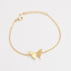 "These personalized butterfly bracelets will be perfect thank you gifts for your wedding, anniversaries, and birthdays. You can also gift these to your best friends, bridesmaids and sorority sisters! Great minimal bracelets for layering or for easy, everyday wear. D E T A I L S - Delicate Initial Butterfly charm - Butterfly Size: 13mm x 17 mm - Hand-Stamped Initial of your choice - We can stamp Uppercase letters, numbers,♡ (heart) - Available in Gold, Rhodium, or Rose gold Plated - This listing Rose Gold Adjustable Jewelry With Butterfly Charm, Adjustable Rose Gold Jewelry With Butterfly Charm, Rose Gold Butterfly Jewelry Gift, Rose Gold Butterfly Jewelry For Gifts, Butterfly Shaped Rose Gold Jewelry For Gifts, Butterfly Shaped Rose Gold Jewelry Gift, Adjustable Dainty Butterfly Bracelet, Rose Gold Jewelry With Butterfly Charm As Gift, Rose Gold Butterfly Charm Jewelry As Gift