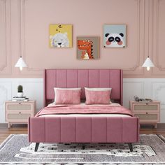 a bedroom with pink furniture and pictures on the wall