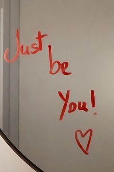 a mirror with writing on it that says just be you