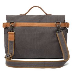 Take a trip back in time with our large vintage canvas messenger bag! This spacious and stylish shoulder bag is the perfect companion for modern adventurers looking for a practical and comfortable fashion accessory. With its traditional style, smart design and ability to hold a 14 inch laptop, this unisex messenger bag is perfect for everyday use or travel. Discover the perfect canvas messenger bag for your daily commute Our vintage canvas messenger bag is a timeless accessory that's perfect for Canvas Satchel Bag For Adventure, Canvas Satchel For Adventure, Gray Canvas Shoulder Bag Satchel, Gray Canvas Shoulder Satchel, Rectangular Canvas Shoulder Bag For Adventure, Canvas Rectangular Shoulder Bag For Adventure, Canvas Satchel Briefcase With Luggage Sleeve, Canvas Satchel Shoulder Bag For Adventure, Adventure Canvas Satchel Shoulder Bag