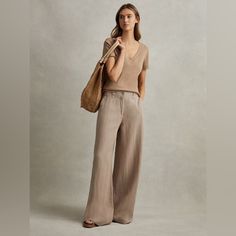 The Demi Trousers Are A Lightweight Linen Option, Rendered Here In A White Shade, Ideal For Summertime Plans. This High-Rise Style Has Been Garment-Dyed For A Soft Touch And Individual Appearance, Giving A Fresh Outlook To Your Rotation. Tuck In A Relaxed-Fitting Shirt For Effortless Style. 100% Linen. Garment Dyed. High Rise. Wide Leg. Cotton Lining. In The Color Mink Neutral Size 12 Petite Like New Condition Rise - 13” Inseams- 29” High Rise Style, Jumpsuit Trousers, Effortless Style, Pant Jumpsuit, Wide Leg, High Rise, Size 12, Pants For Women, Like New