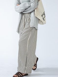 Elevate your ensemble with these high-waisted striped trousers, boasting a loose fit and split-joint accents. Offering both style and comfort, they're a versatile choice for any occasion. Styling Striped Pants, Striped Pants Outfit, High Waisted Flowy Pants, Stripe Pants Outfit, Closet Revamp, Coco Bliss, Pants Outfit Work, Winter Favorites, Striped Trousers