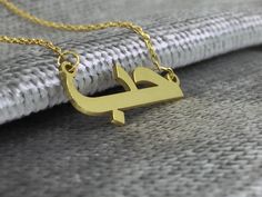 Arabic Name Necklace, Personalized Arabic Necklace, Custom Arabic Necklace, Personalized jewelry, Name Necklace, Moms Gift, Birthday Gift Gold This perfect Arabic name necklace is the perfect gift for your loved ones. You can personalise this name necklace as you wish. * The size of the necklace can be small or large depending on the letter! *Custom Name Necklace will be handmade with your desired name.You can have your own name personalized on this necklace. * Material: High Quality 585 14K Sol Handmade Gold Necklace For Anniversary, Gold Necklace With Name On Round Pendant, Handmade Gold Custom Necklace For Anniversary, Cadmium-free Yellow Gold Necklace For Gifts, Custom Gold Name Pendant Necklace, Handmade Gold Custom Necklace As Personalized Gift, Gold Custom Pendant Necklace For Personalized Gift, Handmade Gold Custom Necklace For Personalized Gift, Custom Gold Pendant Necklace For Personalized Gift