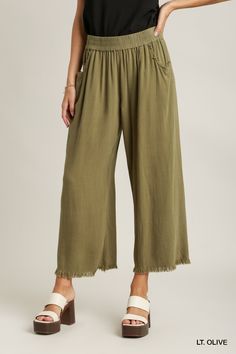 introducing our breezy bliss linen pants, where effortless style meets ultimate comfort for all your summer adventures! these pants feature a trendy elastic waistband and wide-leg silhouette, offering a relaxed yet chic look that's perfect for any occasion. crafted from a luxurious blend of linen and cotton, they provide breathability and softness, ensuring you stay cool and comfortable all day long. complete with convenient side pockets and frayed hem bottoms for a touch of laid-back charm, the Relaxed Fit Wide Leg Pants For Vacation, Wide Leg Harem Pants With Pockets For Vacation, Summer Rayon Wide Leg Pants, Summer Wide-leg Rayon Pants, Vacation Wide Leg Pants With Pockets, Breezy Wide Leg Cotton Bottoms, Breezy Wide-leg Pants For Spring, Summer Wide Leg Harem Pants For Loungewear, Breezy Wide Leg Pants For Spring