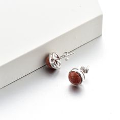 Lewa (Enduring Beauty) The Lewa earrings embody the simplicity of beauty that is timeless, featuring a significant gemstone that is encased within 9.2mm x 9.2mm sterling silver. Dimensions Earring size: 9.2mm x 9.2mm x 3.4mm Gemstone size: 8mm x 8mm Weight: 1.4g Material: 92.5% Sterling Silver Plating: Gold, Silver, Rose Gold Timeless Sterling Silver Jewelry With Matching Earrings, Timeless Sterling Silver Earrings, Timeless Sterling Silver Pierced Earrings, Modern Silver Earrings With Birthstone, Modern Silver Birthstone Earrings, Classic Sterling Silver Earrings For Her, Classic Sterling Silver Earrings As Gift For Her, White Gold Sterling Silver Gemstone Earrings, White Gold Earrings With Round Stone For Gift