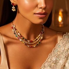 Description :Our three-layer Navaratna necklace is a captivating ode to India's cultural heritage and spiritual significance. With two layers of vibrant Navaratna gemstones, each symbolizing a unique cosmic influence, separated by a layer of glistening CZ stones, this necklace seamlessly blends tradition and contemporary elegance. Beyond a mere jewellery piece, wearing this necklace is a connection to age-old traditions and a vivid symbol of the rich cultural heritage, effortlessly elevating you Navratan Jewellery, Navratna Necklace, Navaratna Necklace, Navratna Jewellery, Navaratna Jewellery, Jewellery 2023, Sari Style, Fashion Illustration Tutorial, Illustration Tutorial