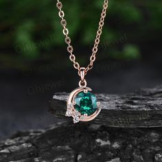 "The necklace is handmade,very high quality! It can be made in white gold,rose gold or yellow gold with 14k or 18k. However for some people who are nickel allergic,I can also make it to 925 sterling silver to make you can wear it. Details: *6.5mm round lab green emerald,about 1ct. *Side stone: Diamonds / moissanites. Chain: 16+2 Inches length. Returns & Warranty 30-Day money back guarantee (starting from the day of delivery). \"Made to Order\" purchases qualify for our 30-day money back guarantee. The 30-day money back guarantee gives you time to make sure your purchase is perfect. If you need to  return it for any reason, I'll be happy to offer an exchange or refund. However,please also know for \"Made to Order\" item,there will be handcrafting and shipping fee charged from the original p Green Emerald Necklace, Emerald Style, Moissanite Pendant, Emerald Necklace, May Birthstone, Bride Jewellery, Green Necklace, Moon Necklace, Green Emerald