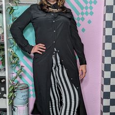 Versatile, High Quality And Just Yes. Slinky Black Silk Shirtdress Featuring Double Flap Pockets On The Chest, Crisp Collar, Smoky Shell-Like Buttons And Curved "Shirt" Style Hemline. Wear This Open And Free, Cinched With A Belt, Wrapped Up Avant Garde Style, Layered Under A Skirt, Or However You Like - There Are So Many Options! Label Polo Ralph Lauren. Marked Size 12 Fits Like A 10 100% Silk, Soft Weighty Drape, Matte Feel, High Quality Unlined, Opaque Buttons Down The Front New With Tags Chic Fitted Rayon Shirt Dress, Black Viscose Shirt Dress For Work, Fitted Black Shirt Dress For Office, Fitted Black Button-up Shirt Dress, Black Fitted Button-up Shirt Dress, Black Rayon Dress For Work, Long Black Shirt Dress For Fall, Black Long Shirt Dress For Fall, Fitted Long Chic Shirt Dress