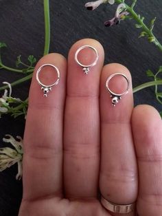 ⚜️ Ornate and eye-catching ⚜️These handmade septum rings are made by me with love and intention in my little home studio. Each one is made from 100% recycled sterling silver (also known as ecosilver) so you can adorn yourself with beauty while treading lightly upon the earth.For all my fellow witches, hippies, punks, and bohemians, these lovely little septum rings are the perfect piece to add a little sparkle to your look. And because they're made from sterling silver, they're hypoallergenic - p Silver Septum Ring For Everyday, Nickel-free Sterling Silver Septum Ring, Everyday Sterling Silver Internally Threaded Septum Ring, Everyday Nickel Free Sterling Silver Septum Ring, Internally Threaded Sterling Silver Small Hoop Septum Ring, Internally Threaded Small Hoop Sterling Silver Septum Ring, Unique Handmade Sterling Silver Cartilage Earrings, Internally Threaded Sterling Silver Septum Ring, Sterling Silver Internally Threaded Small Hoop Septum Ring