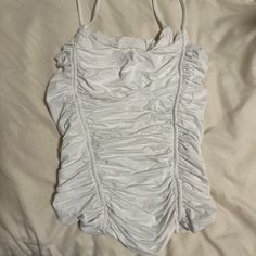 Nwot. Beautifully Made, Thick Tank Top From Isa Boulder! Small Make Up Mark Inside The Tank, Would Likely Come Out With Washing. White Tank Strap Tops For Beach, Fitted Ruffle Cami Tank Top, Stretch Ruched Tank Top, Fitted Ruched Camisole Top, Fitted White Tank Top With Built-in Bra, Ruched Stretch Camisole With Tank Straps, Party Camisole Top With Ruched Detail, White Fitted Cami Tank Top, Fitted Ruched Tank Camisole