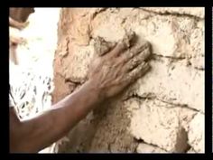 a man is touching the wall with his hands