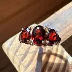 Beautiful, Vintage Three Stone Oval Shaped Garnet Ring Set In 10k Yellow Gold. Us Size 8.5- 9. Stamped 10k And Vip. Luxury Garnet Rings Hallmarked, Luxury Hallmarked Garnet Rings, Garnet Ring With Prong Setting, Luxury Red Three Stone Jewelry, Luxury Red Three-stone Jewelry, Classic Ruby Ring Collectible, Classic Collectible Ruby Ring, Collectible Ruby Ring In Fine Jewelry Style, Collectible Fine Jewelry Ruby Ring