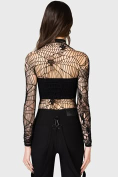 WEBS GRASP.- Soft, stretch fishnet.- Statement web style net with interwoven skulls.- Long sleeves.- Fitted.With KIHILIST branding, 94% Polyamide, 6% Elastane.Hand wash cold (30°c) / Do not bleach / Do not tumble dry / Iron at low temperature / Do not dry clean. Imported. Black Sheer Mesh Top For Festival, Black Stretch Gothic Mesh Top, Edgy Fishnet Mesh Top For Night Out, Punk Style Mesh Top For Clubbing, Stretch Mesh Top With Open Knit, Fitted Hollow Out Mesh Top For Party, Gothic Black Stretch Mesh Top, Stretch Open Knit Mesh Top, Black Fitted Mesh Top For Festivals