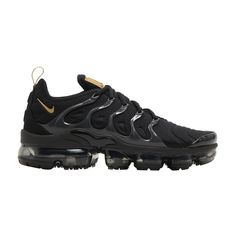 Find NIKE Air Vapormax Plus ' Metallic Gold on Editorialist. An all-black release that channels two Nike legacies in one, the Nike VaporMax Plus sneaker combines the wavy cage upper of the Nike Air Max Plus sneaker with the instantly recognizable cushioning unit of the Nike VaporMax shoe. This 'Black Metallic Gold' version features a blacked-out palette with a touch of metallic gold at the Swoosh, tongue and pull tab. Underfoot, a transparent VaporMax sole unit complements this ultra-sleek design. Streetwear Sneakers With Air Cushioning, Nike Air Max Low-top For Streetwear, Dynamic Low-top Nike Air Max For Streetwear, Functional Low-top Nike Air Max For Streetwear, Dynamic Streetwear Sneakers With Air Cushioning, Nike Air Max For Streetwear, Nike Air Max With Boost Midsole For Streetwear, Nike Air Max Running Shoes For Streetwear, Nike Running Shoes With Cushioned Footbed For Streetwear