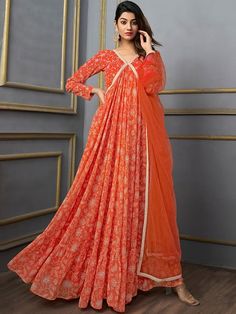 Colour: orange & white Floral printed V-neckLong, regular sleevesAnarkali shape with empire styleGotta patti detailAnkle length with flared hemMachine weave regular georgette V-neck Anarkali Set For Diwali, Designer Orange Salwar Kameez, Orange Georgette Sharara For Navratri, Orange Kurta With Cutdana For Eid, Orange Cutdana Kurta For Eid, Orange Semi-stitched Sharara With Straight Kurta, Orange Kurta With Sheer Dupatta For Navratri, Orange Straight Kurta Sharara For Navratri, V-neck Anarkali Set With Dupatta