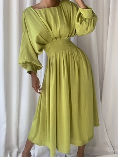 Green Pleated A-line Maxi Dress, Green Evening Dresses With Pleated Sleeves, Chic Green A-line Pleated Dress, Green Silk Long Sleeve Midi Dress, Green A-line Long Sleeve Dress For Spring, Formal Green Silk Midi Dress, Green Silk Midi Length Dress, Green Midi Length Silk Dress, Spring Pleated Long Sleeve Dress