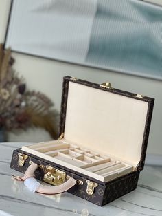 Beige This Monogram jewelry case is especially suitable for carrying precious items when traveling. There are thirteen compartments of different sizes, which are opened and closed by S lock and two suitcase mortise locks. This product is expected to arrive in more than three months. Detailed features: 34 x 26 x 10 cm (length x height x width) Luxury Rectangular Travel Jewelry Storage Case, Luxury Rectangular Jewelry Storage Case For Travel, Luxury Rectangular Jewelry Storage For Travel, Luxury Jewelry Storage Box, Rectangular, Luxury Gold Rectangular Jewelry Storage, Luxury Rectangular Storage Case, Louis Vuitton Yayoi Kusama, Louis Vuitton Capucines, Large Cosmetic Bag