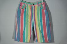 "Here's a great pair of colorful pastel colors cotton denim jean, quality tailored shorts by the high end Stuffed Shirt 80's / 90's vintage collector's made in U.S.A . label. You will love knocking about in these unique figure flattering vertical striped, medium rise summer long shorts! They are great for all outdoors activities and have a very original look and eye-catching appeal. They are in really great condition, too! Check out the photos and measurements and get this really great original Vintage Multicolor Bottoms With Pockets, Fun Multicolor Cotton Bottoms, Retro Cotton Shorts For Spring, Fun Cotton Shorts For Spring, Vintage Multicolor Bottoms For Spring, Vintage Cotton Bottoms For Spring, Colorful Cotton Bottoms For Summer, Fun Spring Bottoms With Pockets, Vintage Multicolor Shorts For Summer