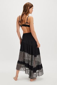 This tiered maxi skirt from Intimately is featured in a unique asymmetrical design with lace paneling for a romantic touch. **Fit:** Mid-rise, A-line, maxi length **Features:** Tiered style, lightweight fabrication, asymmetrical hem, lace paneling, elastic waistband **Why We | Told You So Half Slip by Intimately at Free People in Black, Size: S Lace Skirt Sewing Pattern, Skirt Sewing Pattern, Skirt Sewing, Tiered Maxi Skirt, Skirt Patterns Sewing, Half Slip, Sewing Skirts, Asymmetrical Design, Lace Panelled