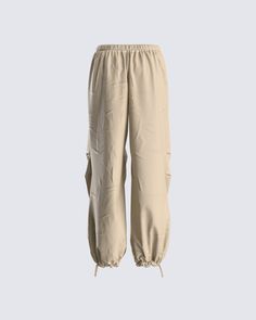 Parachute pants are a baddie essential, we don't make the rules 😜 Made with cargo pockets, an elastic waistband, and a functional drawcord for an adjustable look that is comfy, yet stylish 🖤 Loosely Fitted Ankle-length Cargo Pants For Streetwear, Trendy Streetwear Pants With Elastic Waistband, Utility Parachute Pants For Loungewear, Ankle-length Cargo Bottoms For Streetwear, Cargo Pockets Ankle-length Bottoms For Streetwear, Sporty Ankle-length Cargo Pants With Side Pockets, Loosely Fitted Parachute Pants With Cargo Pockets For Loungewear, Streetwear Ankle-length Parachute Pants With Elastic Waistband, Solid Color Streetwear Pants With Elastic Waistband