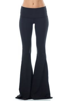 With a classic hue the Teeki Solid Black Bell Bottom will be your new go-to. This Teeki bell bottom offers an all new length 3 inches longer than the original style, allowing you to cut them to your perfect length! A chic Black hue makes the Teeki Bell Bottoms easy to wear and easy to pair with practically anything! Made of a soft recycled water bottle fabric, with breathability, and 4-way stretch, this pant ensures freedom of movement with minimal impact on the earth. With a Black Bell Bottoms, Black Bell Bottom, Yoga Bottoms, Activewear Fashion, Bell Bottom Pants, Bell Bottom, Yoga Women, Bell Bottoms, The Earth