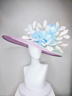 From the 2024 Featured Milliner of the Kentucky Derby Museum  kentucky derby hat large wide brim sinamay purple lavender hat with baby blue feather flowers, white ivory feathers and mint green crinoline adjustable inseam standard approx 23 inches  I can probably add feathers, flowers etc to existing hats for a small fee. I cannot remove anything from existing hats. Just message me and see if we can make it work! :) I cannot make custom order from scratch. My schedule is unfortunately too crazy : Lavender Hat, Feather Flowers, Elegant Hats, Kentucky Derby Hat, Feather Flower, Derby Hat, Blue Feather, Flowers White, Derby Hats