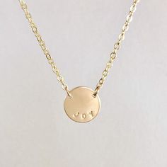 Personalize this gold coin necklace with your name or the name of a loved one, monogram with your initials or a meaningful word. The dainty gold chain may look delicate but it is very strong. The minimalist style adds the perfect amount of sparkle for your everyday outfits. The disc measures 1/2” in diameter. Each necklace is hand crafted and stamped with care with custom text of your choice. Hand stamping is not the same as engraving and lends a softer, more delicate look to this necklace. This Minimalist 14k Gold Hand Stamped Charm Necklace, Minimalist 14k Gold Filled Necklace For Personalized Gift, Minimalist Hand Stamped Initial Necklace, Minimalist Personalized 14k Gold Filled Necklace, Personalized Minimalist 14k Gold-filled Necklace, Personalized Minimalist 14k Gold Filled Necklace, Personalized Minimalist Gold Necklace, Minimalist Hand Stamped Initial Necklace For Everyday, Minimalist Everyday Hand Stamped Initial Necklace