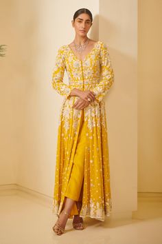 Yellow jacket-style anarkali with  all-over floral motif resham embroidery and pearl, sequin-cutdana work. Comes with pants and dupatta.
Component: 3
Embroidered
Neckline: V Neck
Sleeve Length: Long
Fabric: Organza, Georgette, Spandex Net
Color: Yellow
Jacket-style anarkali
Cutwork detail
Closure: Concealed front placket - Aza Fashions Varun Bahl, Haldi Outfits, Haldi Outfit, Yellow Lehenga, Dress Indian Style, Indian Designer Outfits, Designer Dresses Indian, Indian Fashion Dresses, Indian Outfit