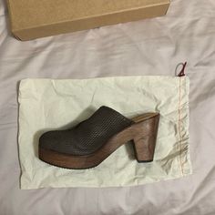 Never Worn Before Women's Trask Shoes. Comes In Original Shoe Box With Shoe Bag. Spring Brown Clogs With Textured Sole, Brown High Heel Platform Clogs, Brown Slip-on Mules With Textured Sole, Chic Leather Clogs With Textured Sole, Chic Clogs With Textured Sole And Round Toe, Brown Textured Sole Slip-on Mules, Brown Almond Toe Sandals With Textured Sole, Brown Leather Platform Mules, Brown Leather Mules With Platform