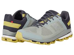 On Cloudsurfer - Men's Running Shoes : Eucalyptus/Citron : Ride that sweet, plush, responsive wave by lacing into the Cloudsurfer from On. On footwear inspires a more efficient running style by promoting a more forward foot strike, as well as a centered and energized running position. Benefits: On delivers a blend of the injury protection found in traditional running shoes, with the natural ride of its lightweight counterpart. Ideal for all types of runners looking for a cushioned, responsive tr Lace-up Trail Running Shoes With Air Cushioning, Dynamic Low-top Sneakers For Hiking, Functional Outdoor Lace-up Running Shoes, Outdoor Low-top Sneakers With Air Cushioning, Low-top Sneakers With Air Cushioning For Outdoor, Low-top Outdoor Sneakers With Air Cushioning, Low-top Trail Running Shoes With Laces, Dynamic Outdoor Sneakers With Laces, Dynamic Sneakers With Laces For Trail Running