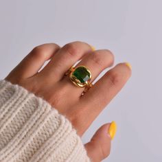 💚 Emerald Ring Green - where bold meets minimalism! This gold chunky ring features a stunning emerald stone on a thick, adjustable band. Perfect for adding a pop of color and style to any outfit. ✨ Irregular Design: A unique, avant-garde ring that stands out. ✨ Comfy & Trendy: Adjustable thick band for a perfect fit. ✨ Waterproof: Made from alloy plated with gold Elevate your look with this colorful gem ring!  Refunds/Returns: You have 14 days after receiving the product to get all of your money back, no questions asked. Shipping & Processing: 1-3 day processing time (+weekends) US 7-12 business days UK 7 business days France,Germany 8 business days Australia 10 business days Everywhere else ~8-15 business days ♡ Insurance: All of your jewelry purchased through my shop has a 3 month insur Modern Green Rings For Everyday Wear, Modern Gold Emerald Open Ring, Everyday Green Emerald Open Ring, Everyday Open Green Emerald Ring, Minimalist Adjustable Emerald Ring, Minimalist Adjustable Green Emerald Ring, Trendy Green Rings As A Gift, Minimalist Green Emerald Open Ring, Trendy Green Rings For Everyday Wear