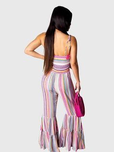 DescriptionMaterial: Polyester and spandex. Very stretchy and comfy to wear.Features: Spaghetti straps. multicolored rainbow stripe overalls. floor-length. flared flowy pants. high waisted.Details: This Striped Wide Leg Bell Bottom jumpsuit shows your charming figures. Trendy to wear.Occasions: Cute Jumpsuits for a party. club. night out. beach. travel. vacation. outgoing. homecoming. and daily wear.Size Chart: Cute Jumpsuits, Bell Bottom Jumpsuits, Summer Jumpsuits, Striped Flare Pants, One Piece Jumper, Trouser Outfit, Pants High Waisted, Flare Jumpsuit, Club Night