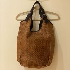 New Without Tags. Never Used And On Excellent Condition. This Bag Has So Much Space! Multiple Interior Pockets To Help Keep You Organized. Silver Hardware Throughout. Light Brown Woven Leather. Elegant Everyday Satchel Straw Bag, Elegant Everyday Leather Straw Bag, Tan Bucket Bag With Detachable Handle, Tan Tote Bucket Bag With Detachable Handle, Shopping Hobo Shoulder Bag With Braided Handles, Hobo Shoulder Bag With Braided Handles For Shopping, Everyday Use Hobo Shoulder Bag With Braided Handles, Tan Top Handle Bag With Braided Handles, Shopping Hobo Bag With Braided Handles