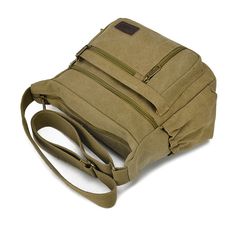 Specification: Product Name Casual Shoulder Crossbody Outdoor Bag Size 30*24*10 CM Material Canvas Casual Travel Backpack Shoulder Bag, Multifunctional Khaki Shoulder Bag For Travel, Casual Outdoor Bag With Adjustable Strap, Casual Travel Bag With Zipper Pocket, Casual Large Capacity Bags For Outdoor, Khaki Large Capacity Backpack, Khaki Large Capacity Standard Backpack, Versatile Khaki Backpack, Casual Softback Shoulder Bag For Outdoor