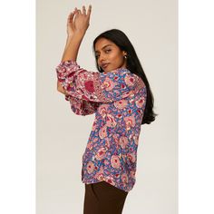 Pink floral viscose (100% Viscose). Top. V-neck. Long sleeves. Front button closure. 25" from shoulder to hemline. Imported. Patterned V-neck Rayon Tops, Patterned V-neck Blouse For Work, Patterned V-neck Workwear Blouse, Floral Print V-neck Tops For Work, Printed Viscose V-neck Top, Summer Floral Print Blouse With Split Neck, Summer Split Neck Blouse With Floral Print, Summer Floral Print Split Neck Blouse, Spring Rayon Top With Split Neck